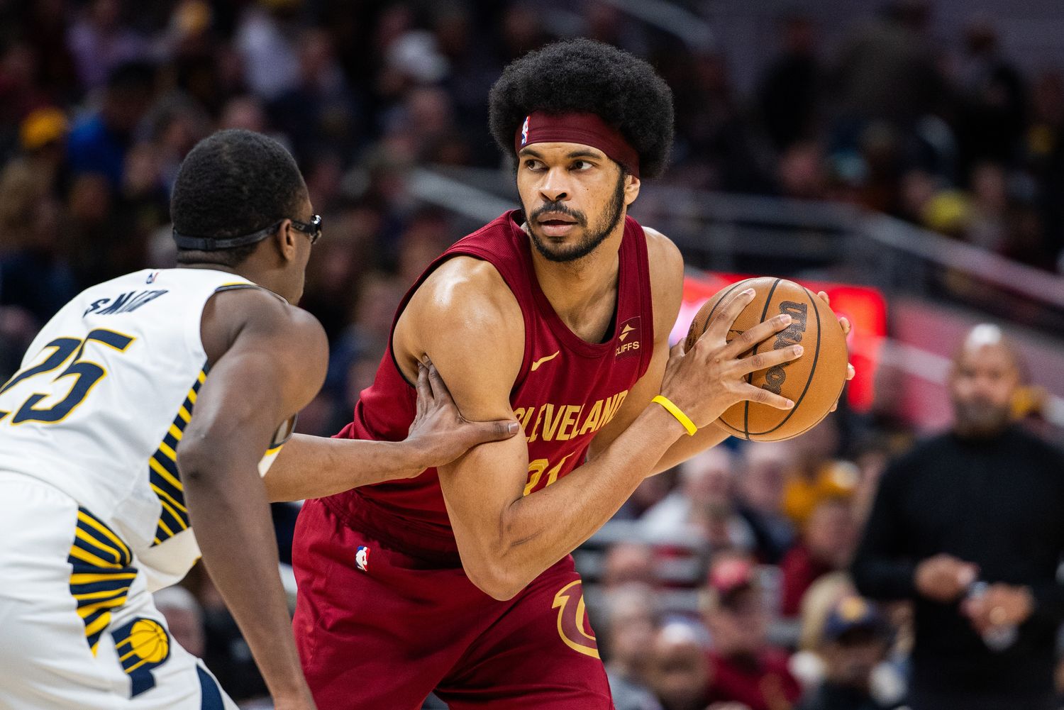 Mar 18, 2024; Indianapolis, Indiana, USA; Cleveland Cavaliers center Jarrett Allen (31) the ball while Indiana Pacers forward Jalen Smith (25) defends in the second half at Gainbridge Fieldhouse.
